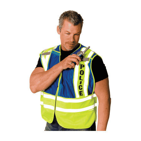 A man wearing a police safety vest and holding a walkie talkie